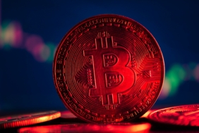 Coins with bitcoin symbol on red light and crypto stocks chart b